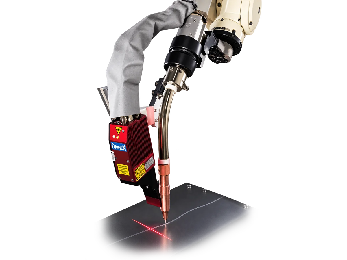 OTC DAIHEN FD-QTS laser seam tracking sensor mounted beside a welding torch